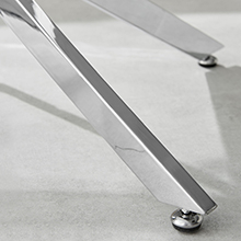 close up of silver chrome metal coffee table legs
